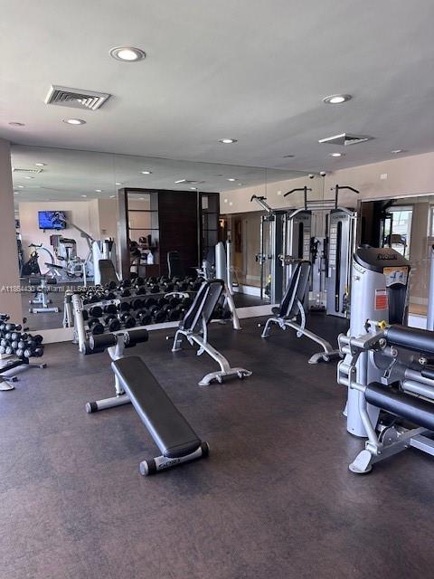 1000 West Island Boulevard, Unit 1511 Aventura, FL 33160 - Photo 36 of 41 a view of a room with gym equipment