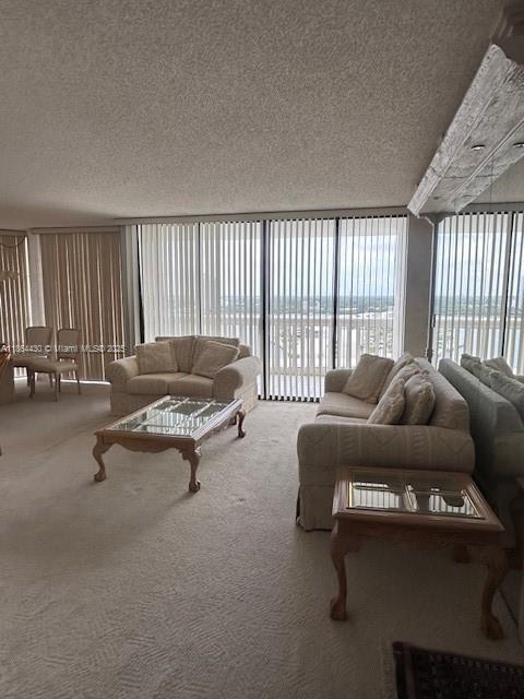 1000 West Island Boulevard, Unit 1511 Aventura, FL 33160 - Photo 4 of 41 a living room with furniture and a window