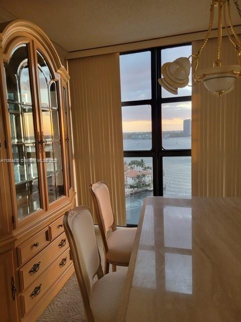 1000 West Island Boulevard, Unit 1511 Aventura, FL 33160 - Photo 8 of 41 a view of a balcony with furniture and window