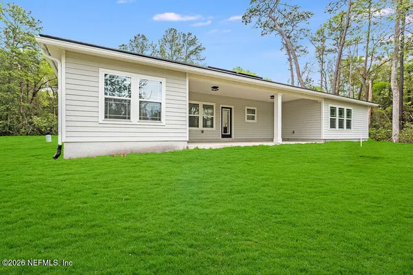 a front view of house with yard