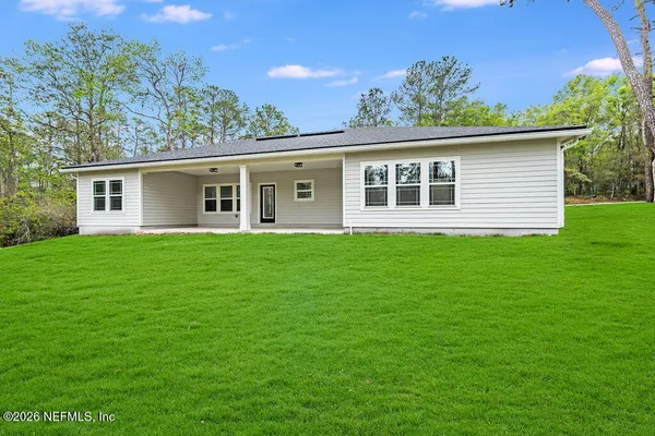 a house view with a garden space