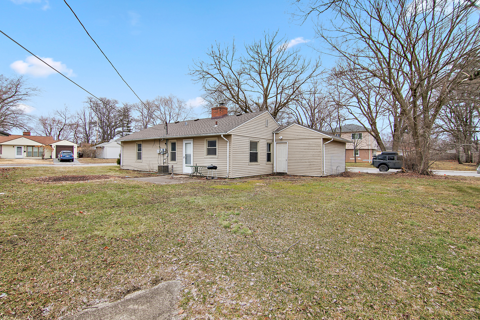 310 Nassau Street Park Forest, IL 60466 - Photo 2 of 19 a front view of a house with large garden