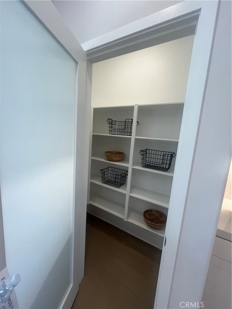 1872 Union, Unit 25 Anaheim, CA 92805 - Photo 11 of 41 a view of walk in closet with empty racks