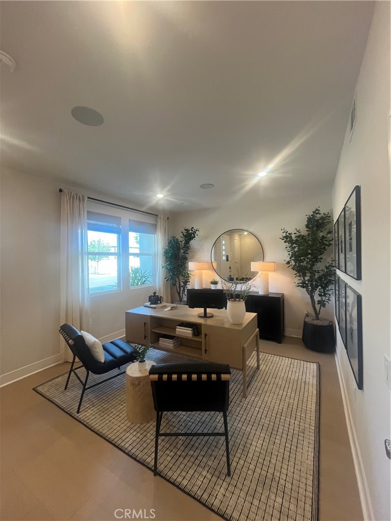 1872 Union, Unit 25 Anaheim, CA 92805 - Photo 6 of 41 a living room with furniture a window and a table