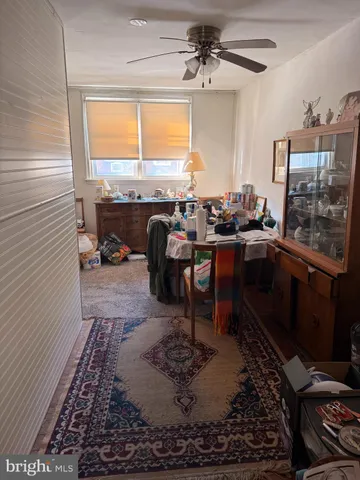 a kitchen with a table chairs and a stove