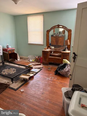 a room with furniture and a wooden floor