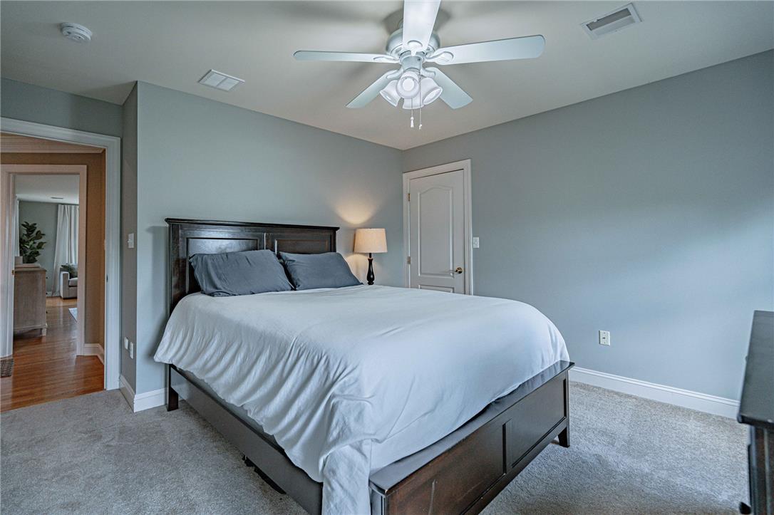 6000 Pond View Terrace Bath, PA 18014 - Photo 46 of 69 Comfortable bedroom featuring a cozy ambiance and a practical ceiling fan.
