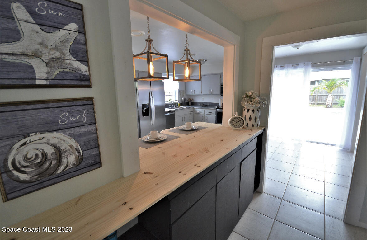 2785 Locksley Road Melbourne, FL 32935 - Photo 18 of 34 a bathroom with a sink and a mirror