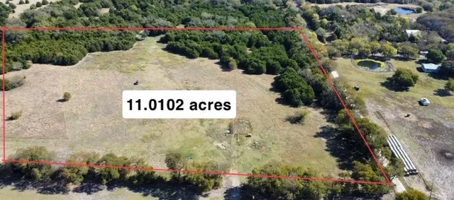 a view of outdoor space with signage and flags