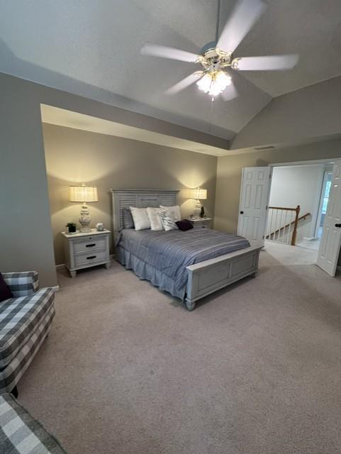 4055 Vista Point Lane Suwanee, GA 30024 - Photo 23 of 42 a spacious bedroom with a bed and a chandelier