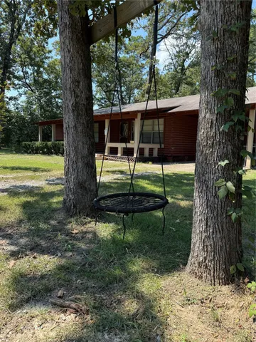 a view of balcony with wooden floor and outdoor space