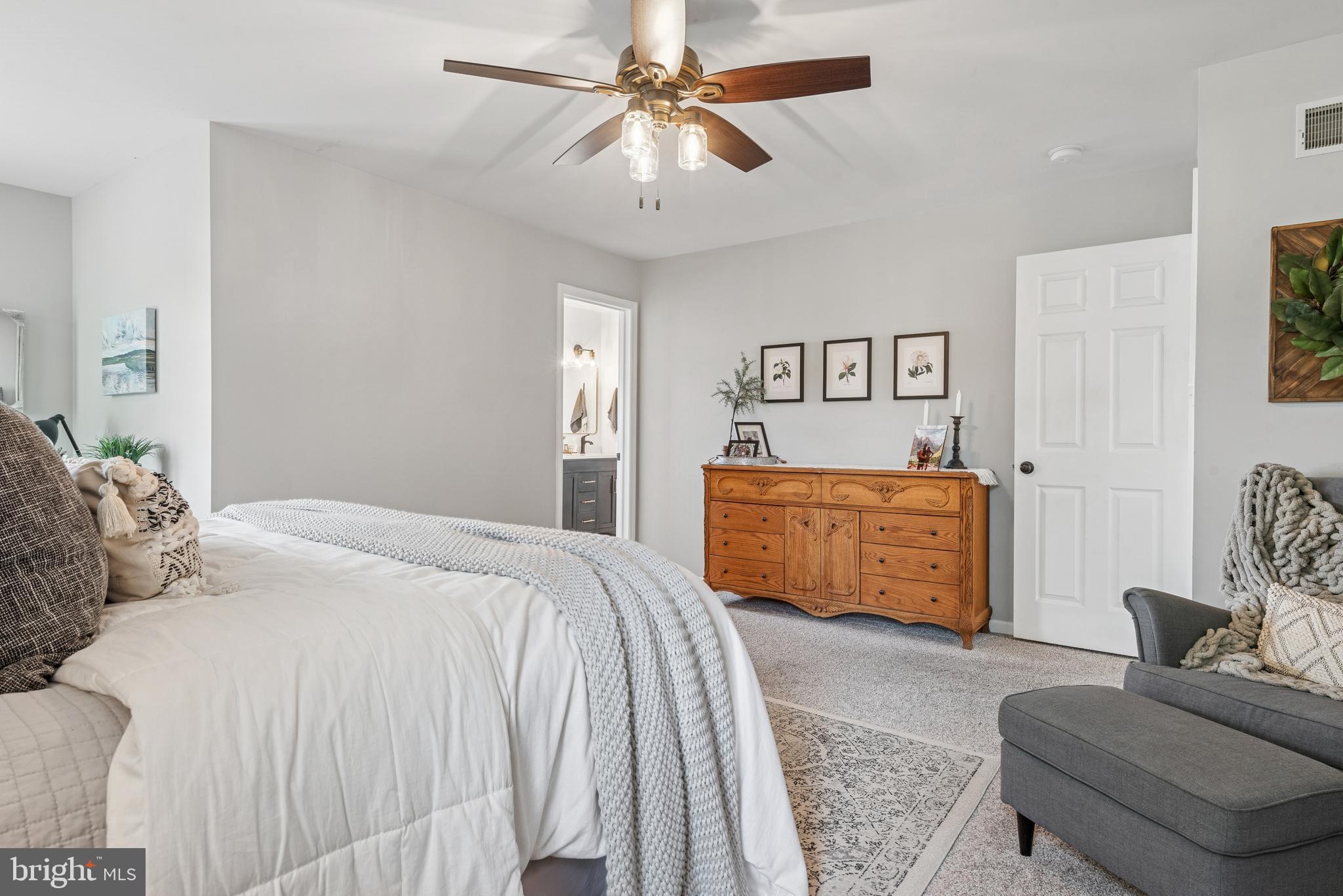 15 Limestone Court Lititz, PA 17543 - Photo 35 of 59 a bedroom with a bed and ceiling fan