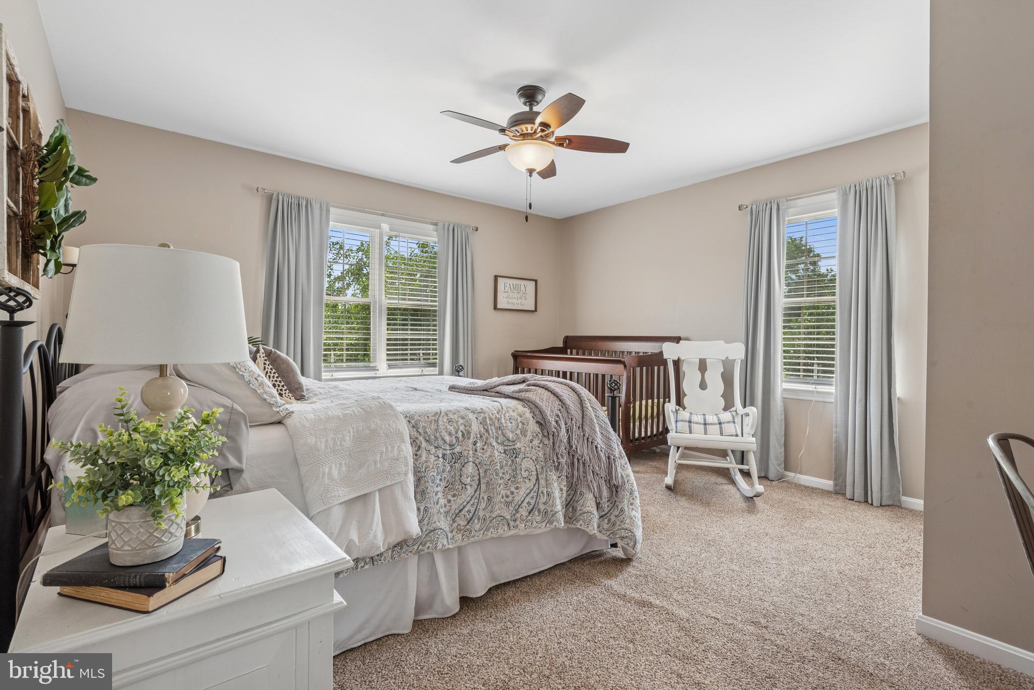 15 Limestone Court Lititz, PA 17543 - Photo 42 of 59 a bedroom with a bed and a chandelier