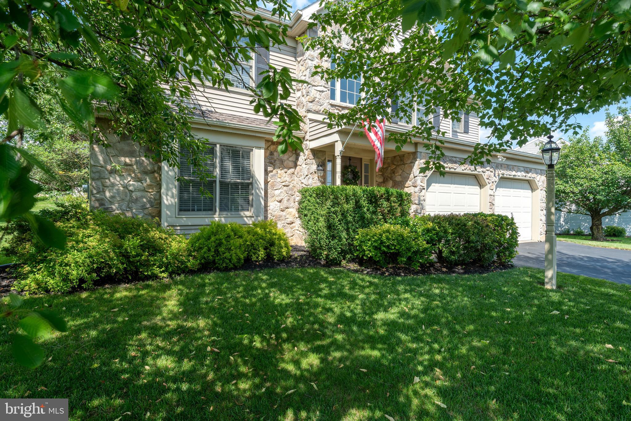 15 Limestone Court Lititz, PA 17543 - Photo 6 of 59 a front view of a house with a yard and garage
