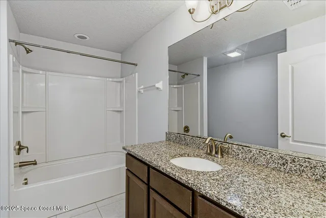 a view of a big room with swimming pool and outdoor space