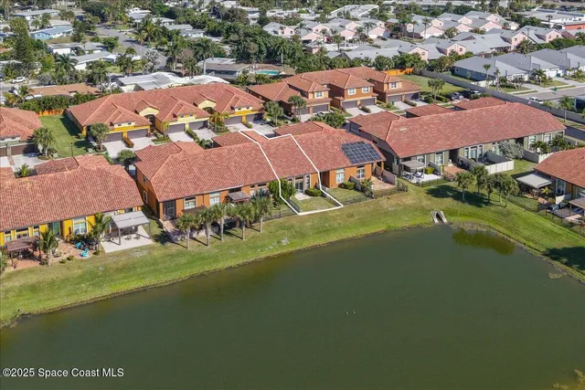 a view of water heater and covered with wooden fence