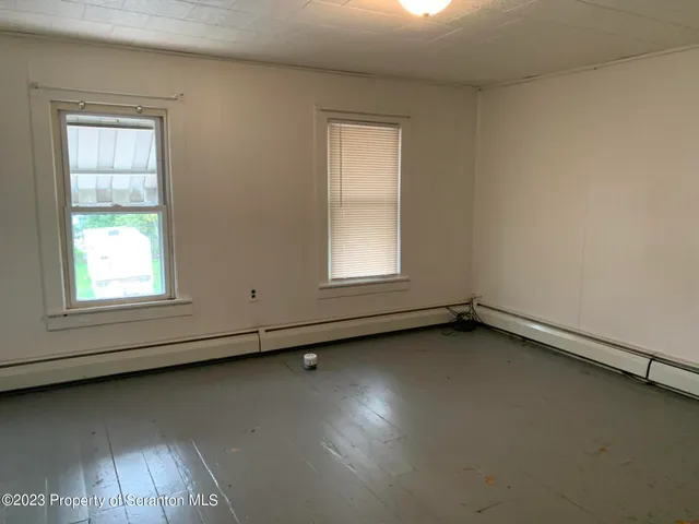 an empty room with a window