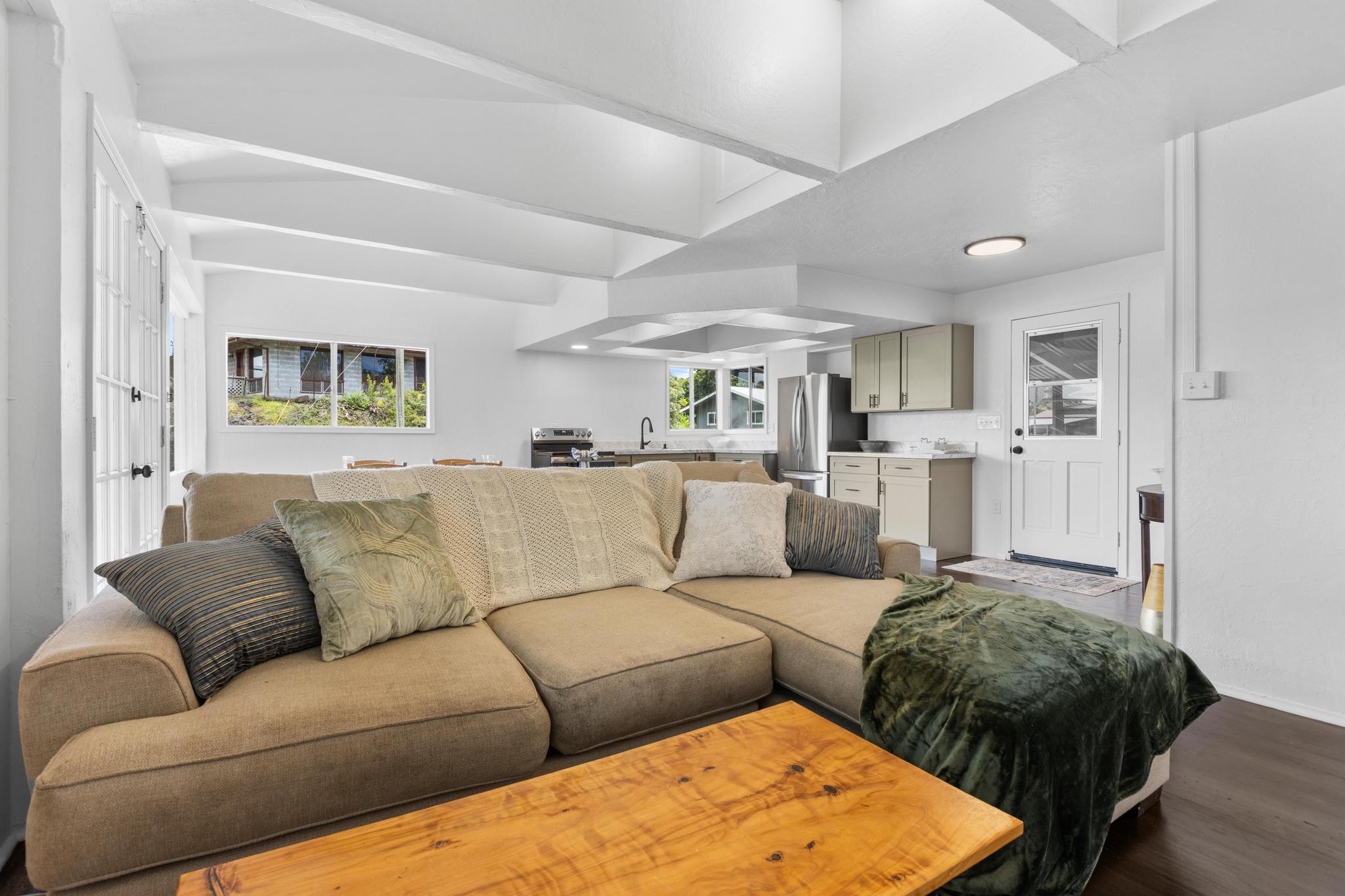 446 Ainaola Drive Hilo, HI 96720 - Photo 12 of 30 a living room with furniture and a large window