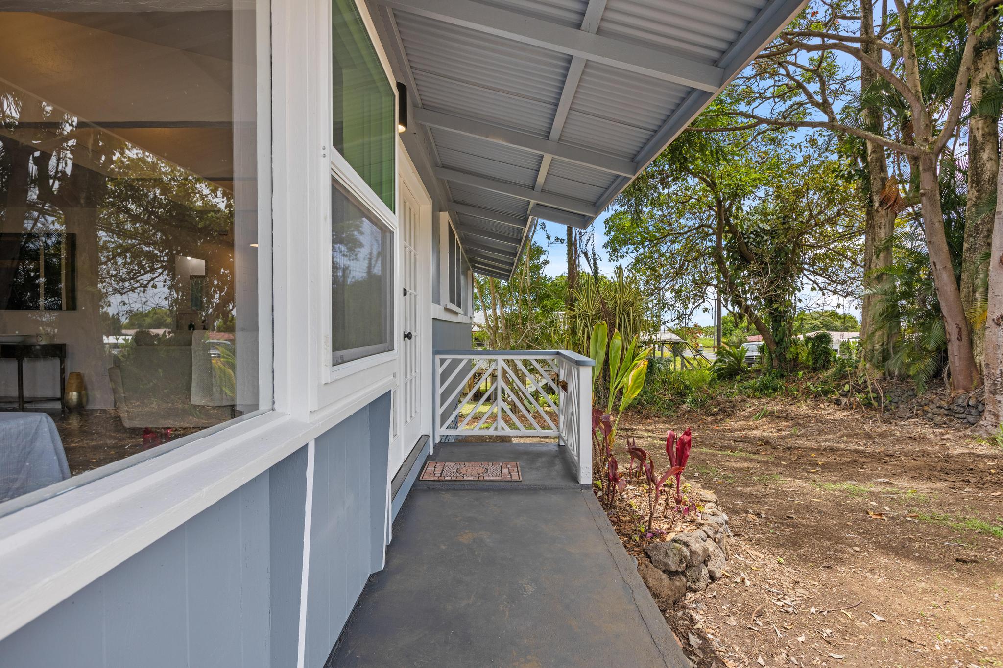 446 Ainaola Drive Hilo, HI 96720 - Photo 2 of 30 a view of a pathway of a house with a porch