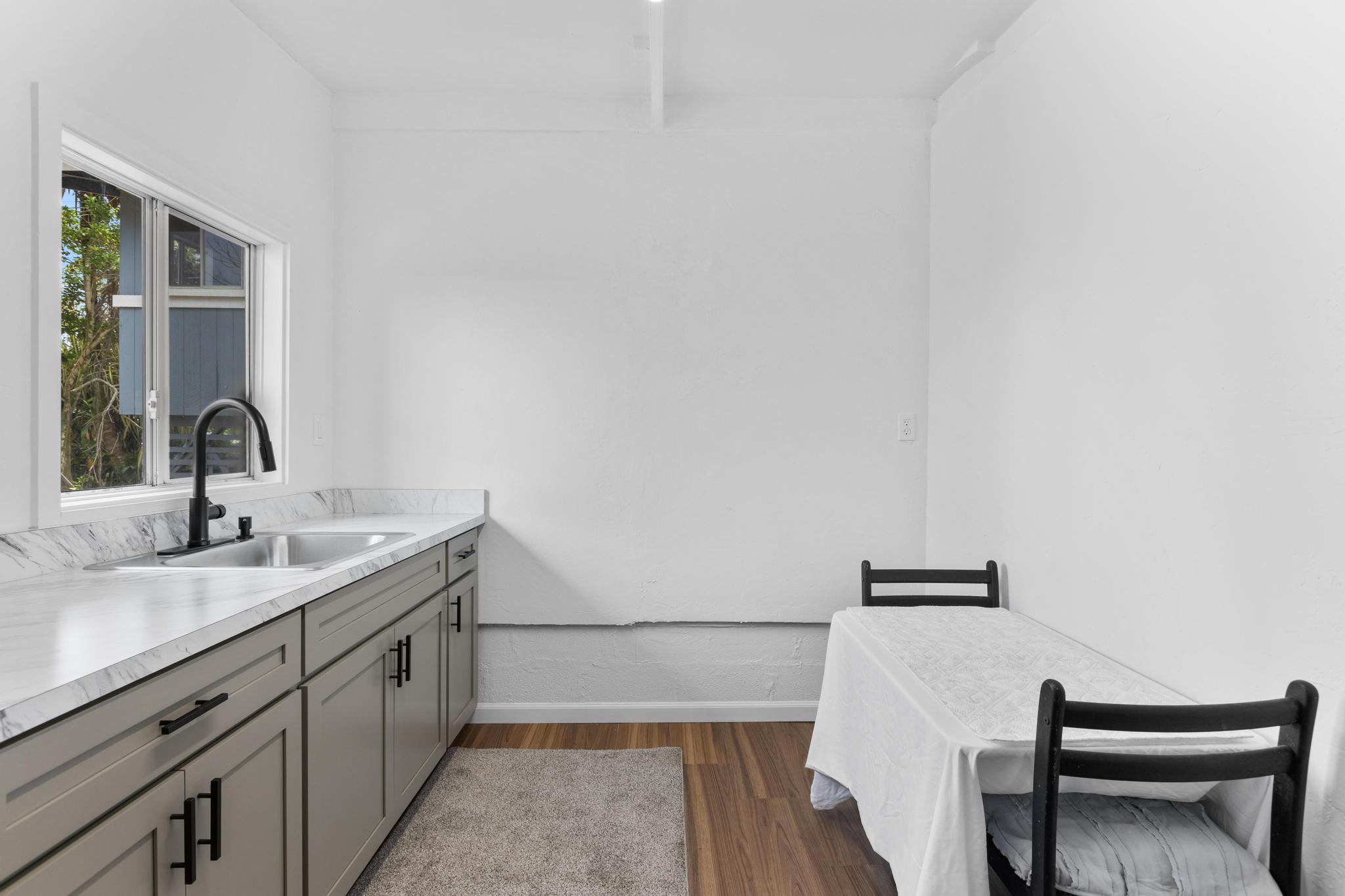 446 Ainaola Drive Hilo, HI 96720 - Photo 21 of 30 a bathroom with a sink and a mirror