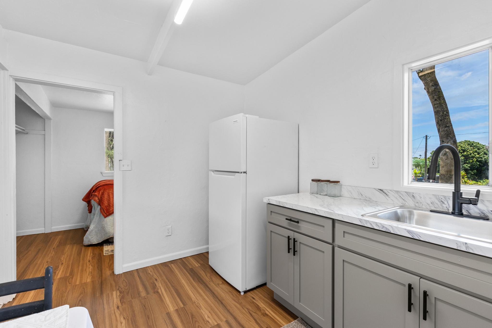 446 Ainaola Drive Hilo, HI 96720 - Photo 22 of 30 a bathroom with a sink and mirror