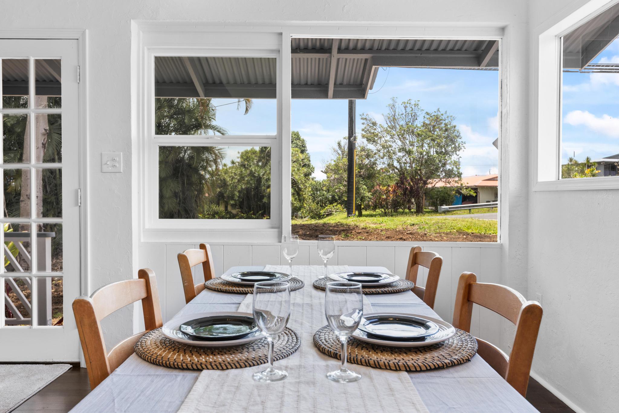 446 Ainaola Drive Hilo, HI 96720 - Photo 8 of 30 a view of a dining room with furniture window and outside view