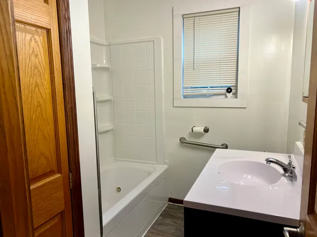 a bathroom with a sink and a bathtub