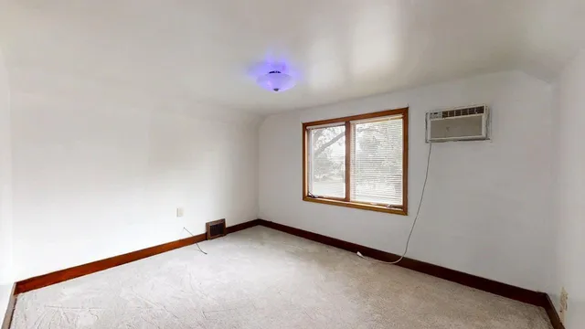 an empty room with a window