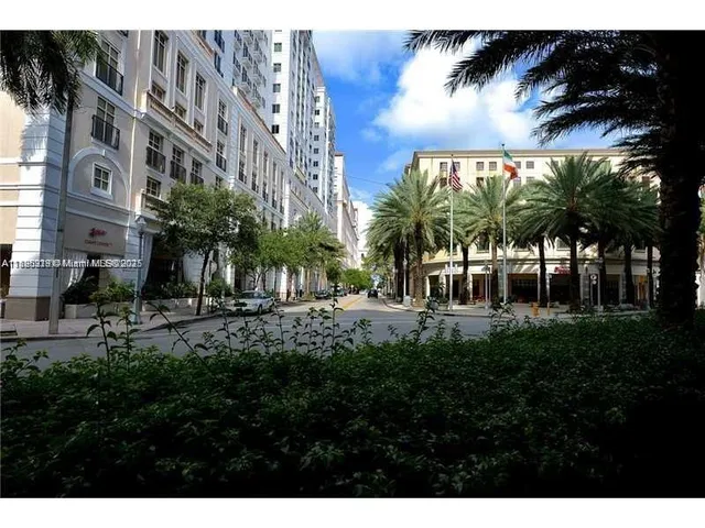 a view of a building with a yard