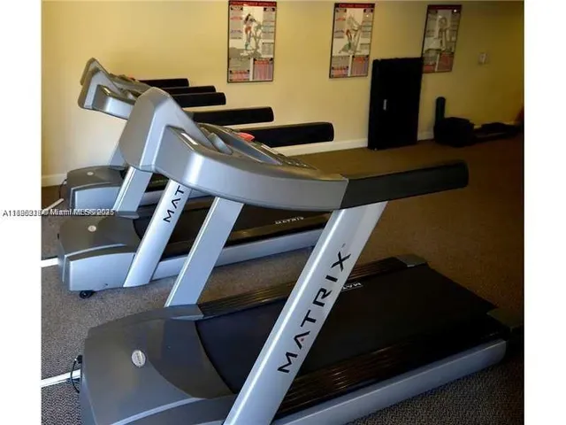 a kitchen with a stove and a microwave