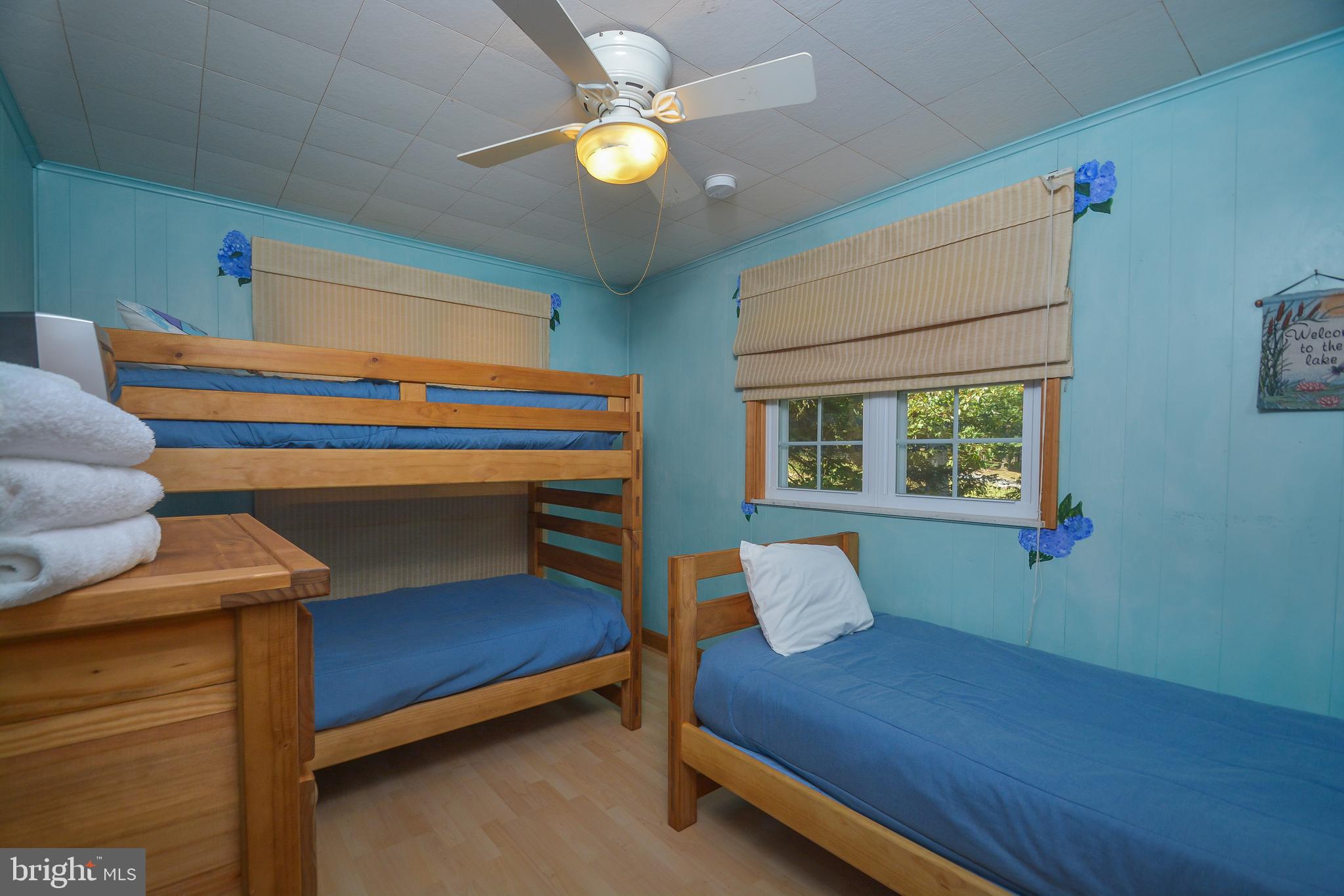 1417 Marsh Hill Road McHenry, MD 21541 - Photo 13 of 34 a bedroom with a bed and a window