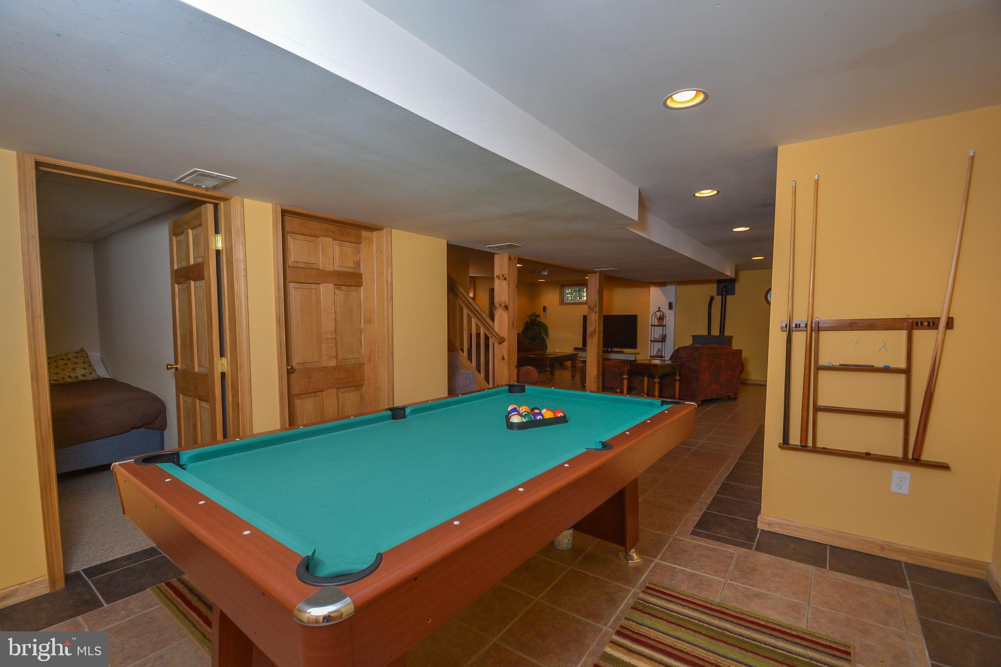 1417 Marsh Hill Road McHenry, MD 21541 - Photo 17 of 34 a room with pool table and two large window