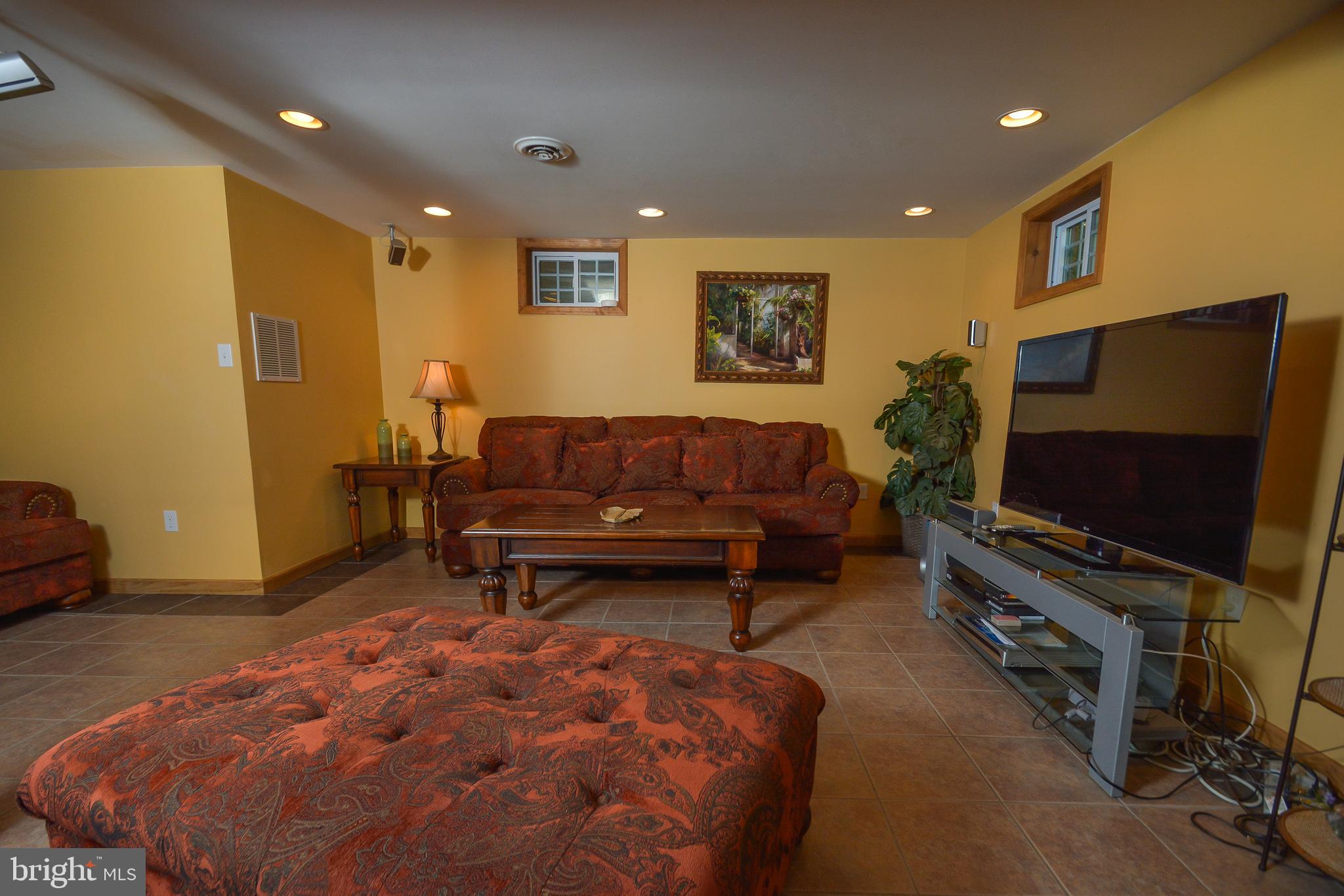 1417 Marsh Hill Road McHenry, MD 21541 - Photo 19 of 34 a living room with furniture and a flat screen tv