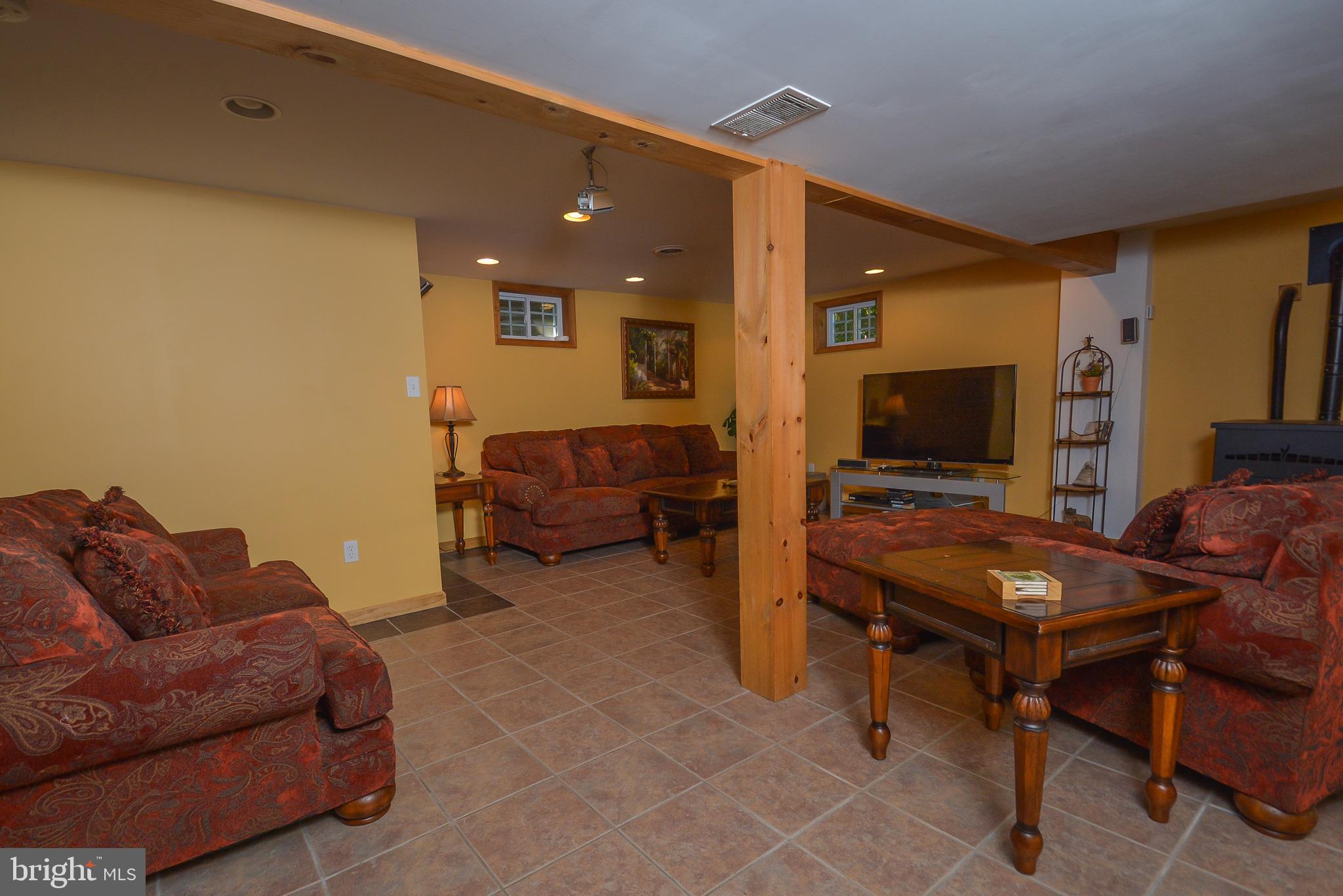 1417 Marsh Hill Road McHenry, MD 21541 - Photo 20 of 34 a living room with furniture and a flat screen tv