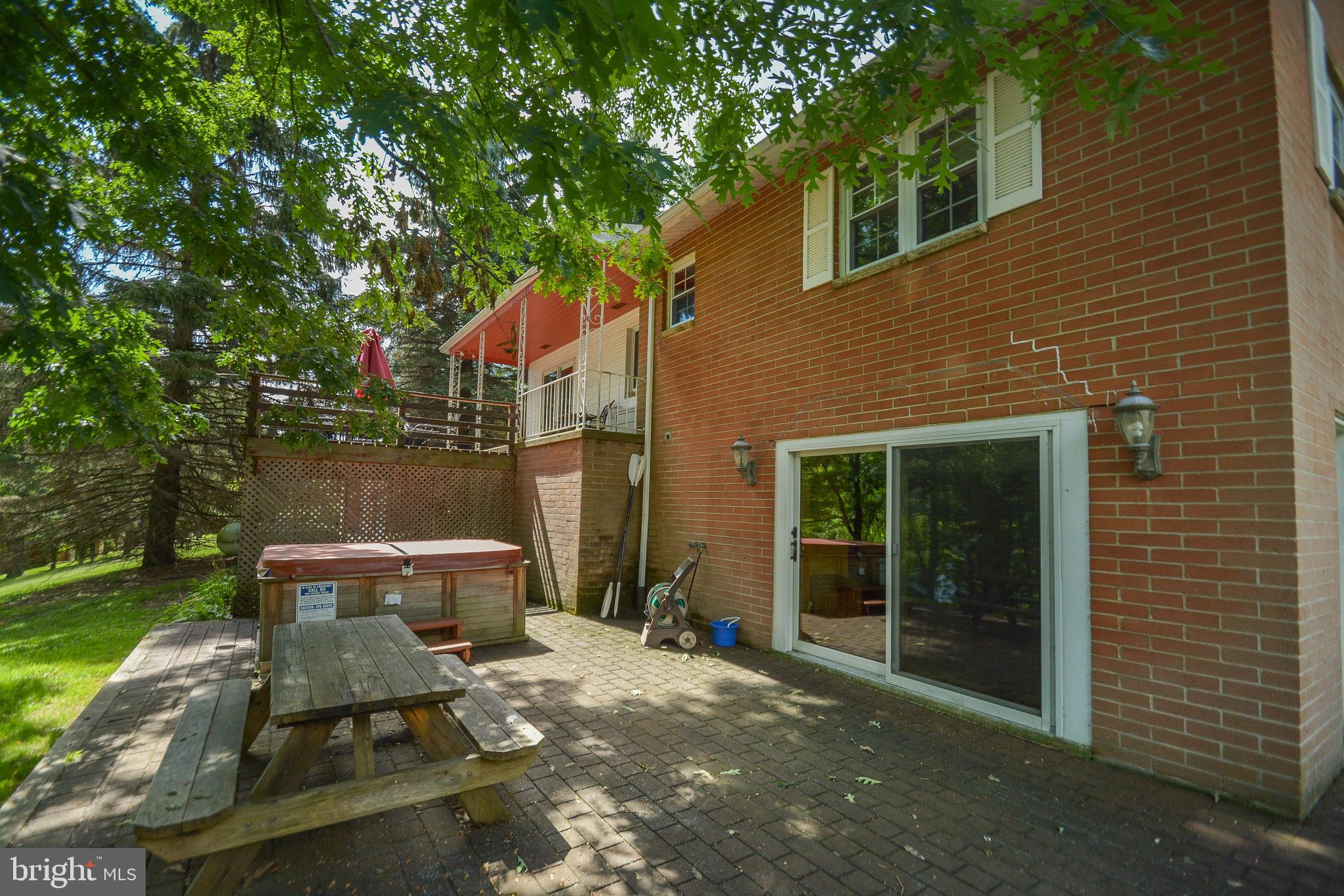 1417 Marsh Hill Road McHenry, MD 21541 - Photo 22 of 34 a front view of a house with a garden