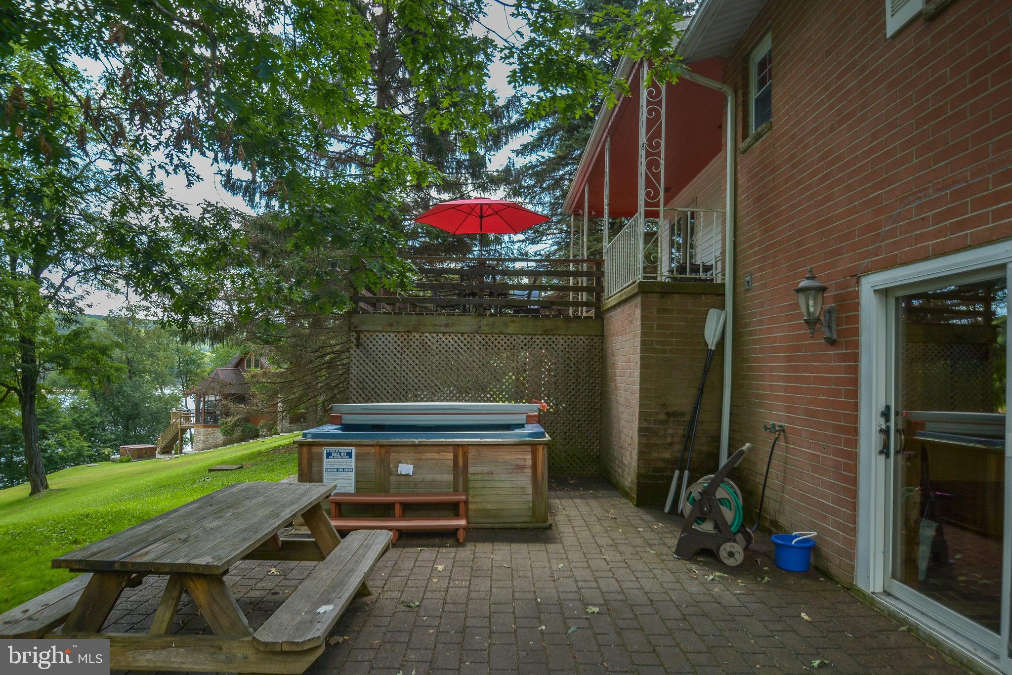 1417 Marsh Hill Road McHenry, MD 21541 - Photo 23 of 34 a front view of a house with a garden