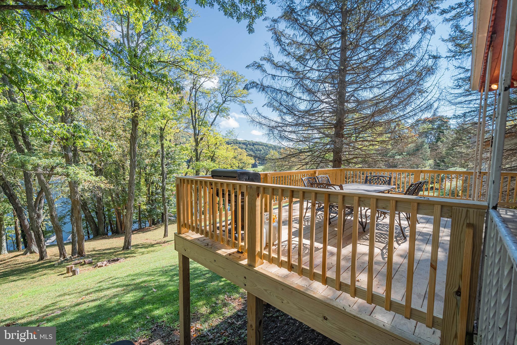 1417 Marsh Hill Road McHenry, MD 21541 - Photo 26 of 34 a view of a deck with a backyard