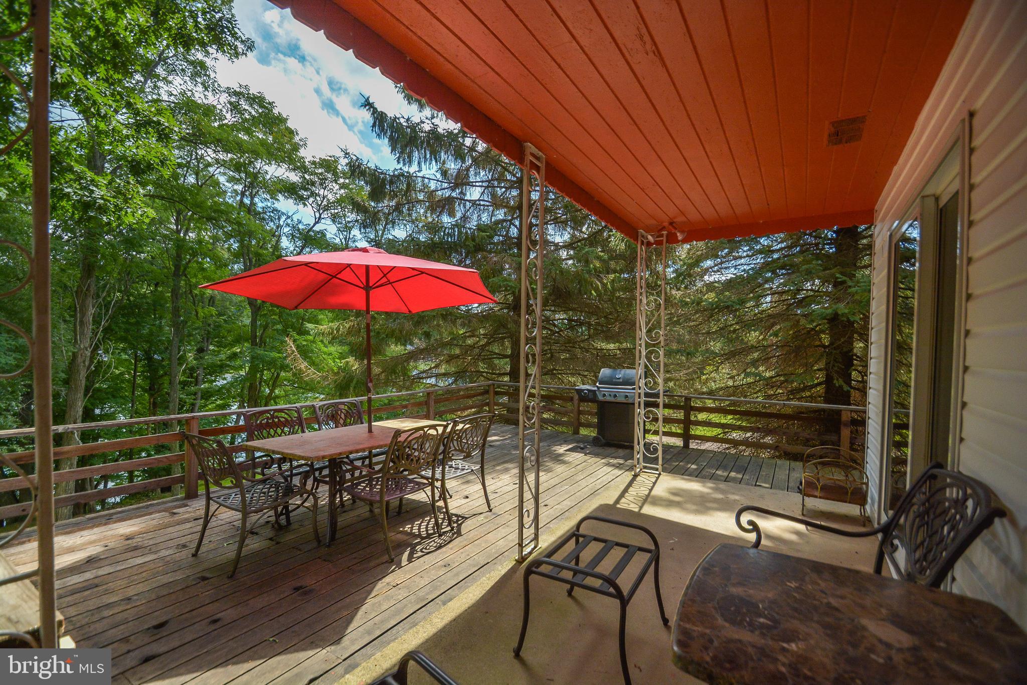 1417 Marsh Hill Road McHenry, MD 21541 - Photo 28 of 34 an outdoor sitting area with furniture and wooden deck