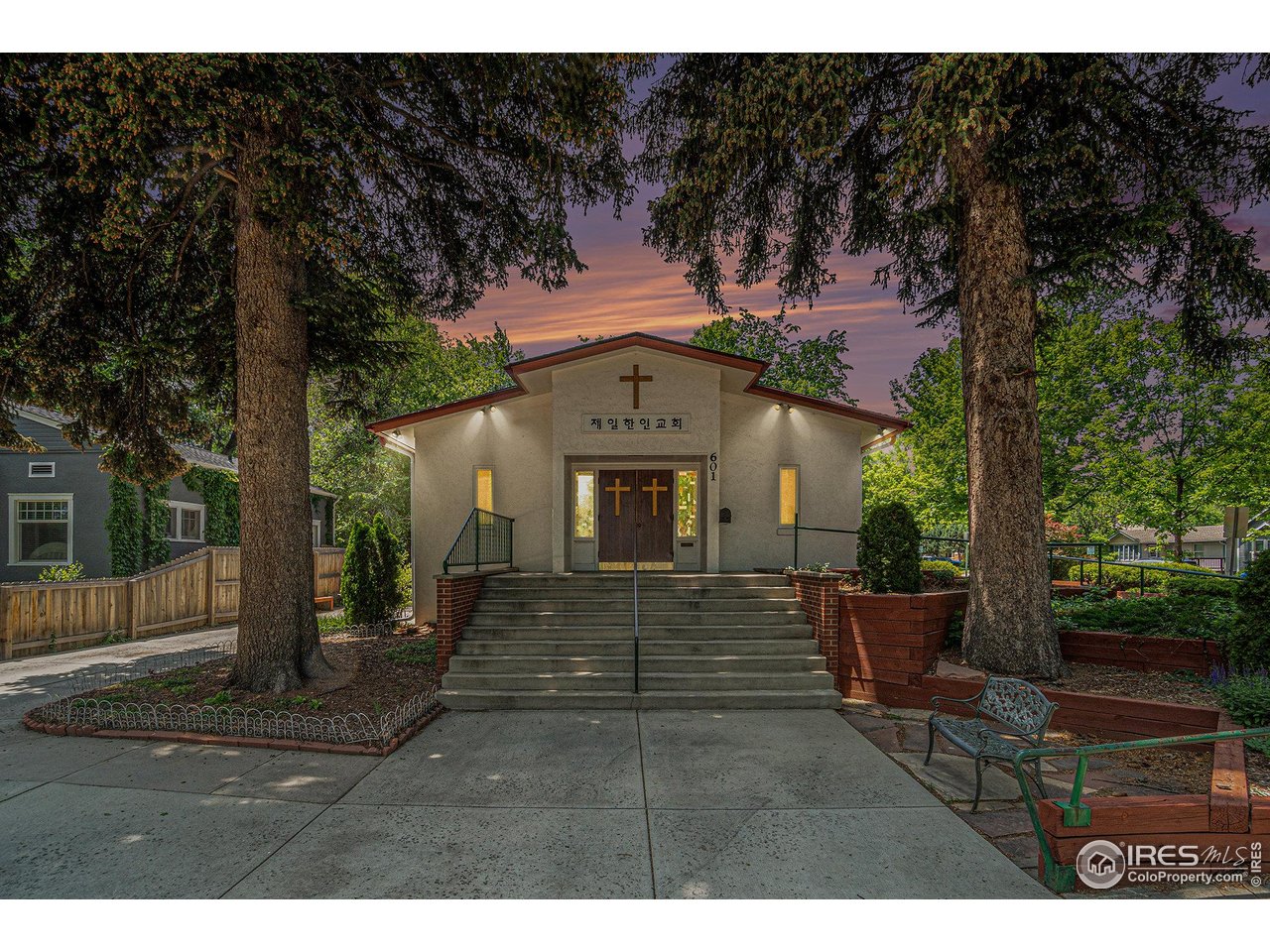 a view of a house with a garden