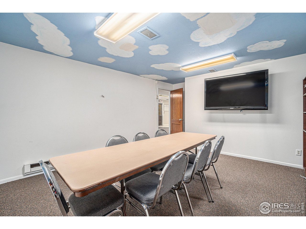 601 South Whitcomb Street Fort Collins, CO 80521 - Photo 21 of 34 a view of a dining room with furniture