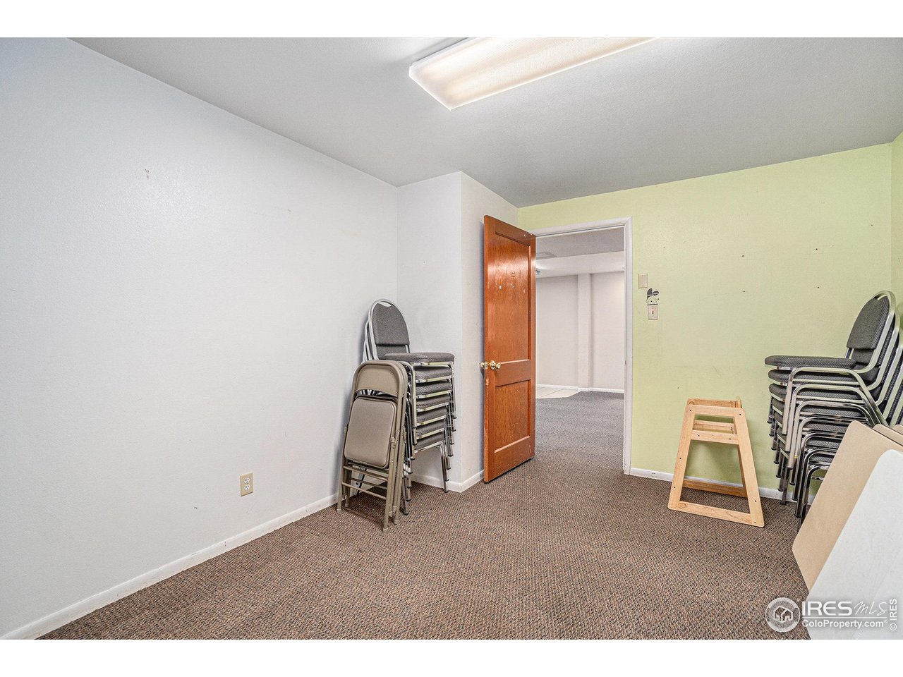 601 South Whitcomb Street Fort Collins, CO 80521 - Photo 26 of 34 a view of livingroom with furniture and staircase