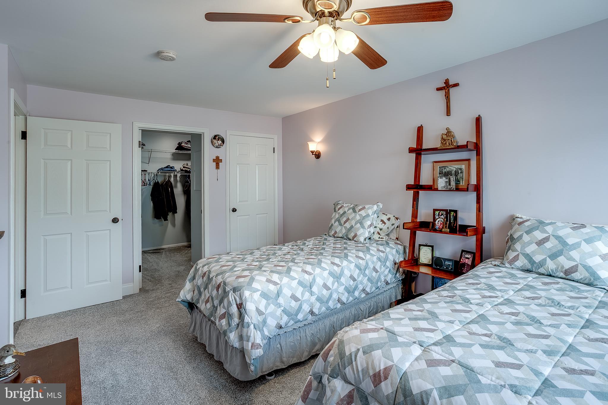 302 Quail Road Marlton, NJ 08053 - Photo 5 of 28 Cozy twin bedroom with soft hues.