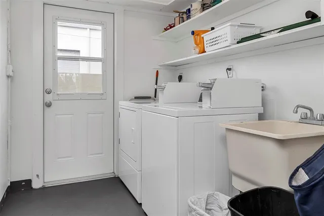 a utility room with dryer and washer