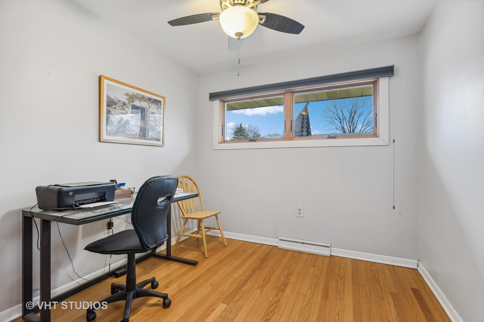 223 Highland Road Grayslake, IL 60030 - Photo 12 of 23 a view of a workspace with furniture and a window