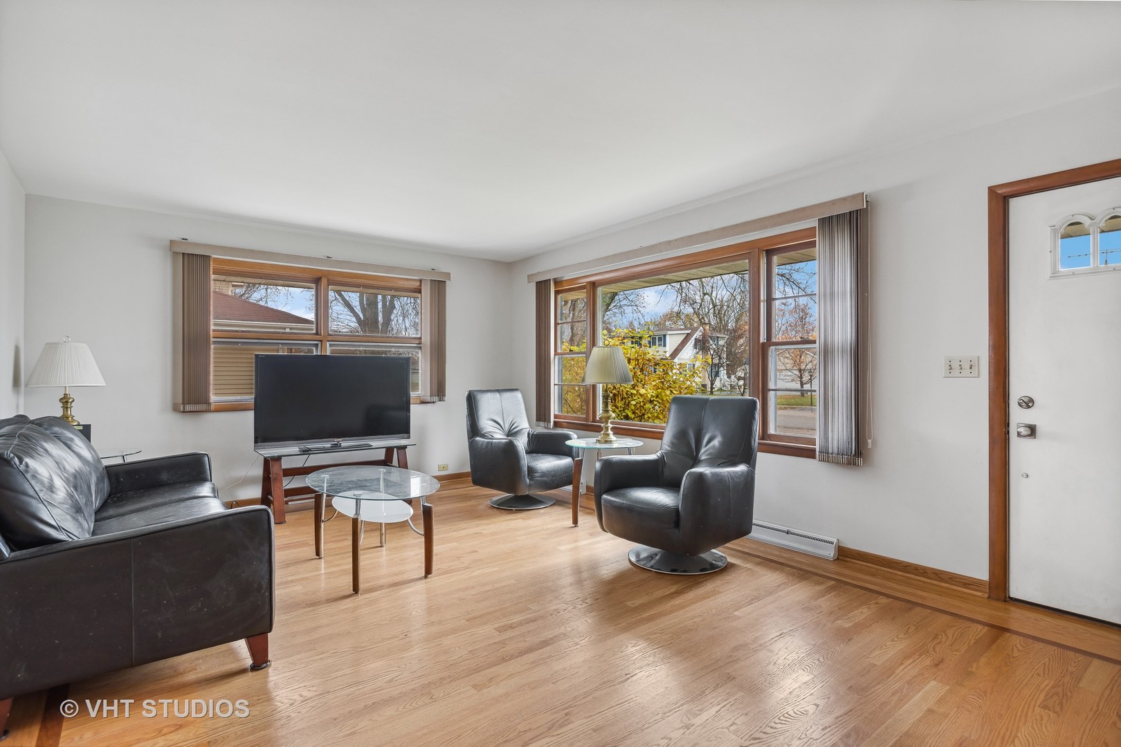 223 Highland Road Grayslake, IL 60030 - Photo 5 of 23 a living room with furniture and a flat screen tv