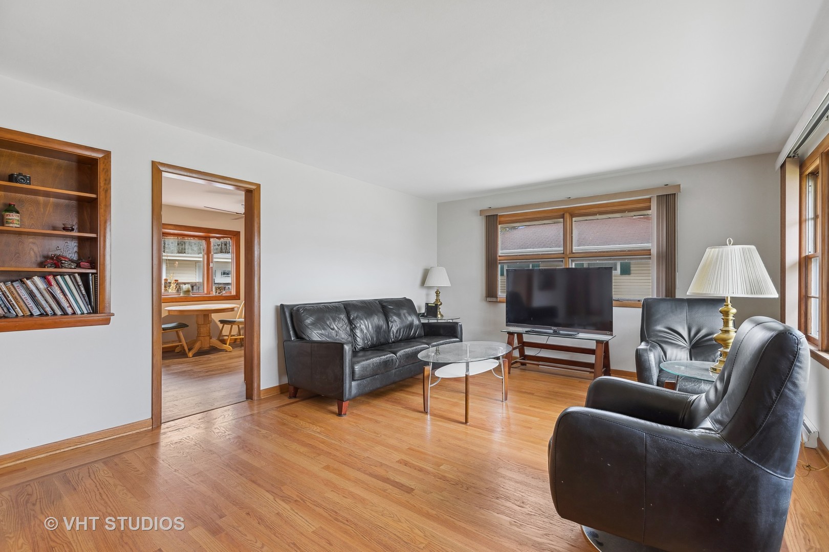 223 Highland Road Grayslake, IL 60030 - Photo 6 of 23 a living room with furniture and a flat screen tv
