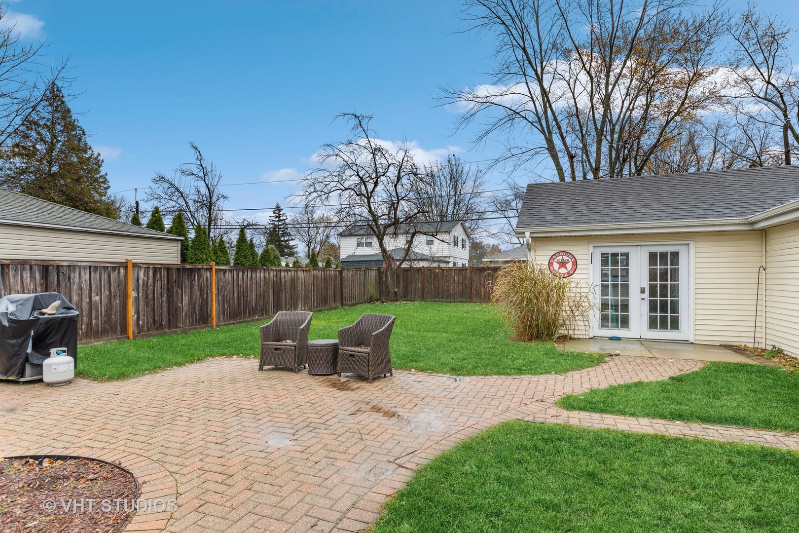 223 Highland Road Grayslake, IL 60030 - Photo 7 of 23 a view of a house with backyard and a garden