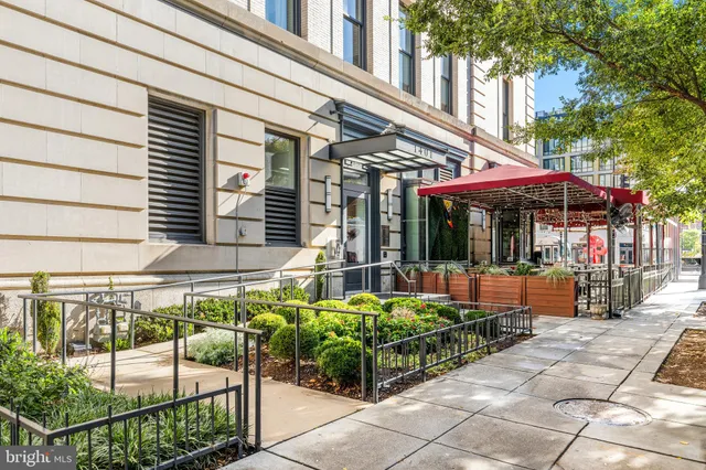 a view of a chairs and table in the patio