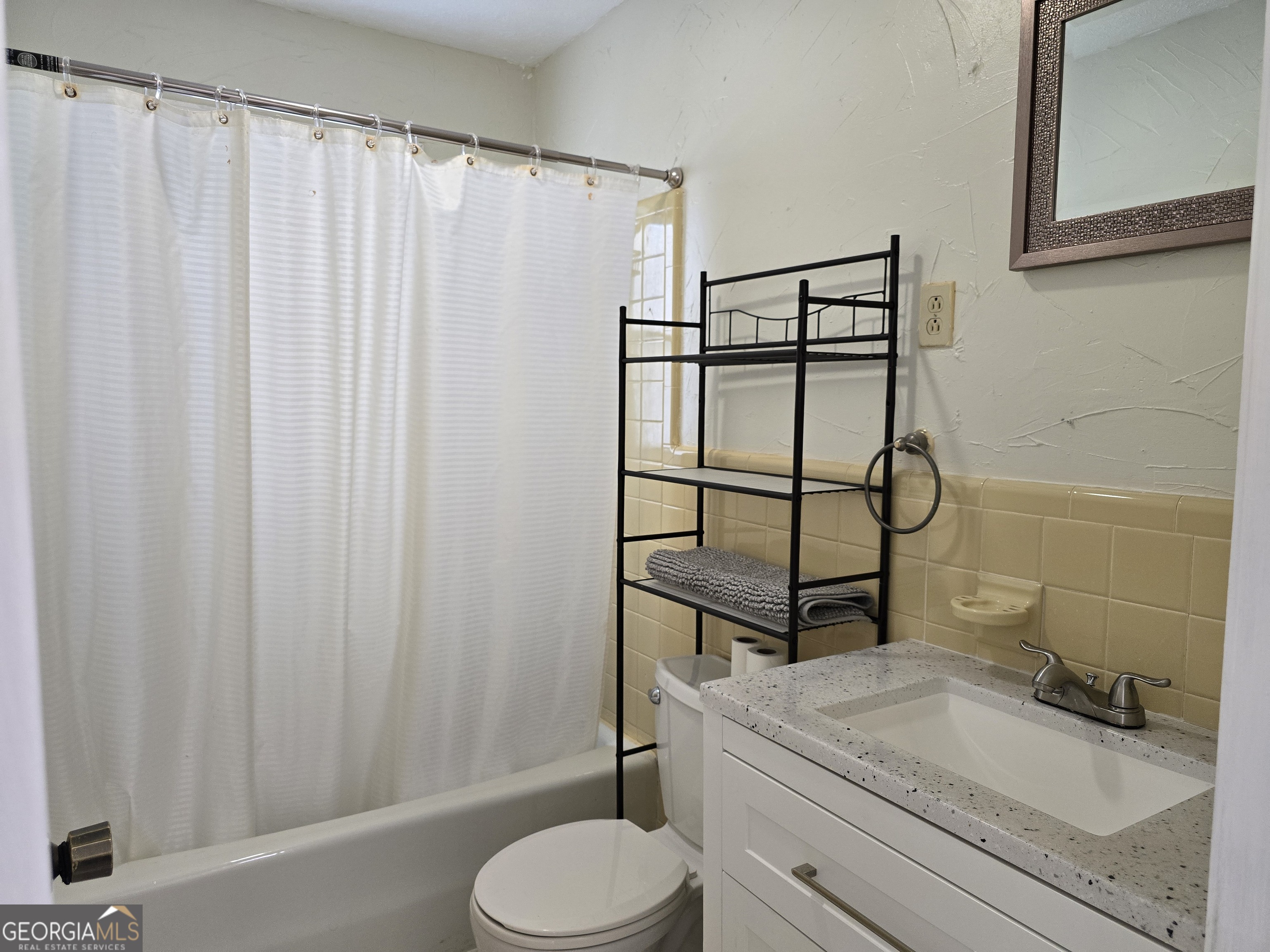 1903 Ridgewood Drive West Point, GA 31833 - Photo 17 of 27 a bathroom with a sink toilet and shower