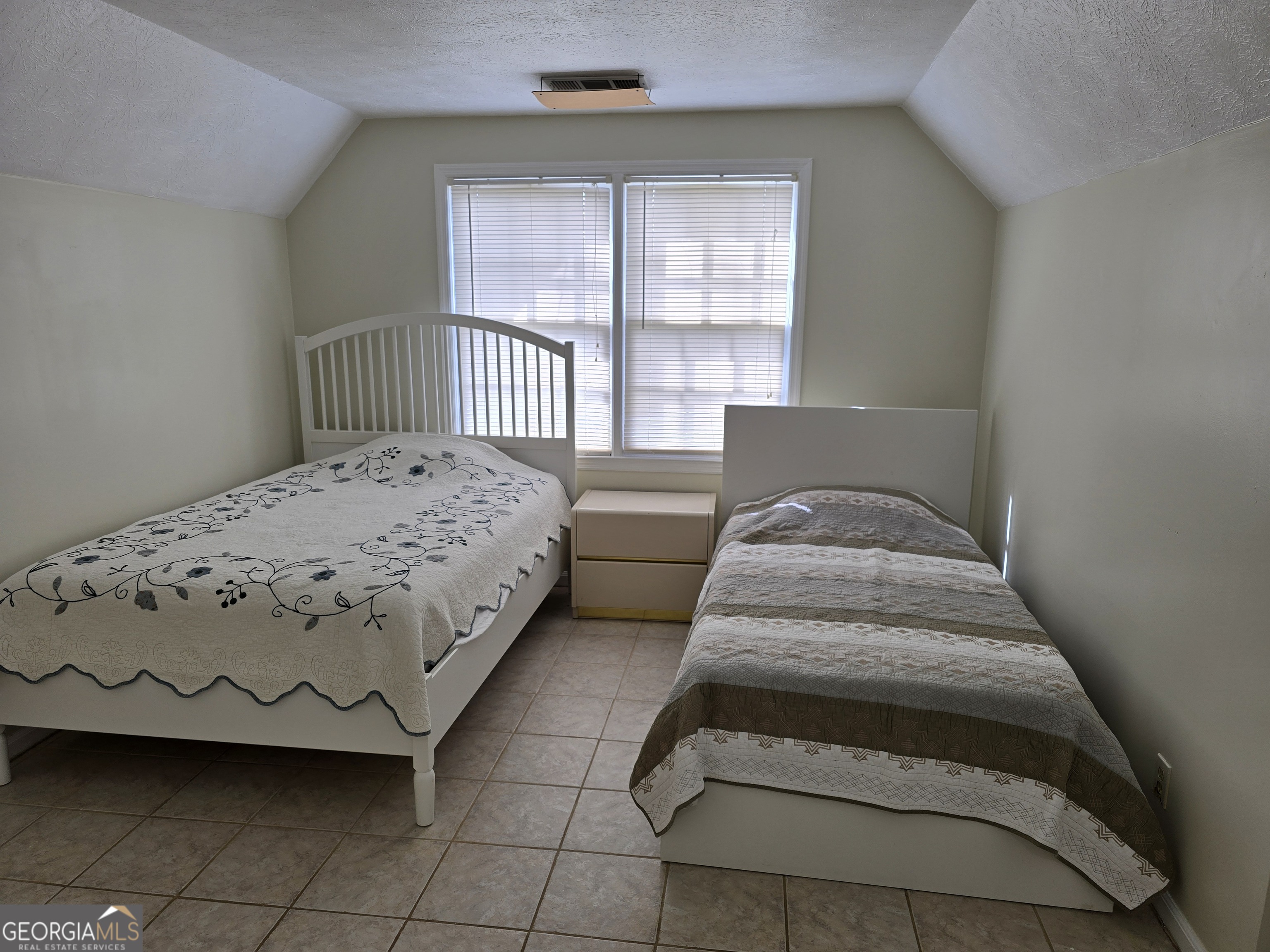 1903 Ridgewood Drive West Point, GA 31833 - Photo 18 of 27 a bedroom with a bed and a window